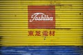 Toshiba sign on garage door
