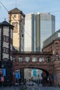 Old versus new concept - old architecture in front of the new buildings Royalty Free Stock Photo