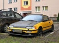 Old veteran grunge popular yellow sports car Honda Civic CRX DOHC parked Royalty Free Stock Photo