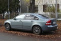 Old veteran Swedish metal blue sedan car Volvo S40 parked