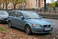 Old veteran Swedish station wagon metal blue car Volvo V50 parked