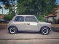 Classic vintage small old grey Morris Mini Cooper parked Royalty Free Stock Photo