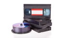 Old Video Cassette tapes with DVD discs Royalty Free Stock Photo