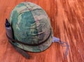 Old Vietnam Vet Helmet With Jungle Green Camouflage Cover