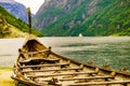 Old viking boat and ferryboat on fjord, Norway