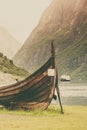 Old viking boat and ferryboat in norwegian fjord Royalty Free Stock Photo