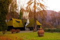 Old village house and Bran Castle, Romania Royalty Free Stock Photo