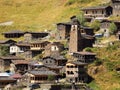 An old village in the mountains, houses with carved wooden balconies and a castle-tower. Dartlo, Georgia