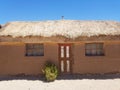 Old village home in South America constructed with clay bricks and mud