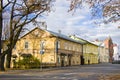 Old village wooden house in Parnu, Estonia. Village near baltic sea, resort for summer holidays. People in the street