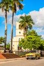 Old Vinales church and yellow retro car on the road, Pinar Del Rio, Cuba Royalty Free Stock Photo