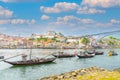 old vinery ships at river Duoro with skyline of Porto in background and bridge ponte luis I in Gaia, Porto, Portugal