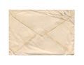 Old vintage aged closed paper envelope isolated on white Royalty Free Stock Photo