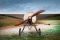 Old vintage airplane with a wooden propeller Royalty Free Stock Photo