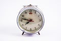 Old vintage alarm clock on white background Royalty Free Stock Photo