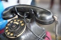 Old vintage antique black phone with rotary disc Royalty Free Stock Photo
