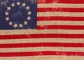 Old vintage Betsy Ross American flag on burlap background Royalty Free Stock Photo