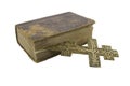 Old vintage bible and big church cross near to it isolated Royalty Free Stock Photo