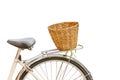 Old vintage bicycle with rattan baskets isolate white backgroun