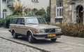 Old vintage big elegant Swedish hatchback car Volvo 240 parked