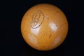 Old vintage billiard ball, number nine. On black background Royalty Free Stock Photo