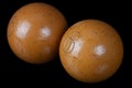 Old vintage billiard balls, number five and six. On black Royalty Free Stock Photo