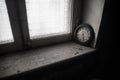 Old and vintage blank clock dial without hand on old wooden table