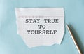 Old vintage blue background with handwritten text - STAY TRUE TO YOURSELF means to have self awareness, knowing your own values,