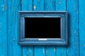 Old vintage blue ornate frame for picture on wall Royalty Free Stock Photo