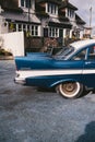 Old Vintage blue with white roof Plymouth Belvedere parked on the sideway on sunny day after the rain Royalty Free Stock Photo