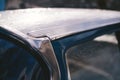 Old Vintage blue with white roof Plymouth Belvedere parked on the sideway on sunny day after the rain Royalty Free Stock Photo