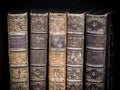 Old vintage books on black textured background