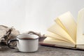 Old vintage books, cup of tea, cake and keys on rustic wooden table Royalty Free Stock Photo