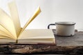 Old vintage books, cup of tea, cake and keys on rustic wooden table Royalty Free Stock Photo