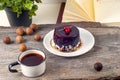 Old vintage books, cup of tea, cake and keys on rustic wooden table Royalty Free Stock Photo