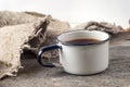 Old vintage books, cup of tea, cake and keys on rustic wooden table Royalty Free Stock Photo