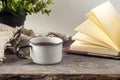 Old vintage books, cup of tea, cake and keys on rustic wooden table Royalty Free Stock Photo