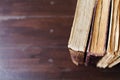 Old vintage books on dark wood background Royalty Free Stock Photo