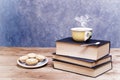 Old vintage books, plate with mince pies and cup of tee with ste Royalty Free Stock Photo