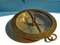 Old vintage brass navy compass. Vintage. Nostalgia. Close up.