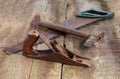 Old vintage building tools on a wooden background Royalty Free Stock Photo