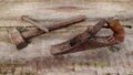 Old vintage building tools on a wooden background