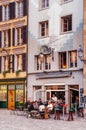 Old vintage buildings and outdoor restaurant in old town Lucerne, Swizerland