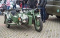 Old vintage camouflage green Soviet military motorcycle with sidecar parked Royalty Free Stock Photo