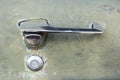 Old vintage car door handle. Retro car door lock Royalty Free Stock Photo