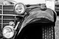 Old vintage car headlight close up. Black and white photo Royalty Free Stock Photo