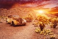 Old vintage car truck abandoned in the desert at the sunset Royalty Free Stock Photo