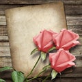 Old vintage card and a bouquet of pink roses