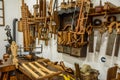 An old vintage carpenter`s wood workshop with lot of tools