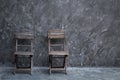 Old vintage chair wooden at dark concrete wall Royalty Free Stock Photo